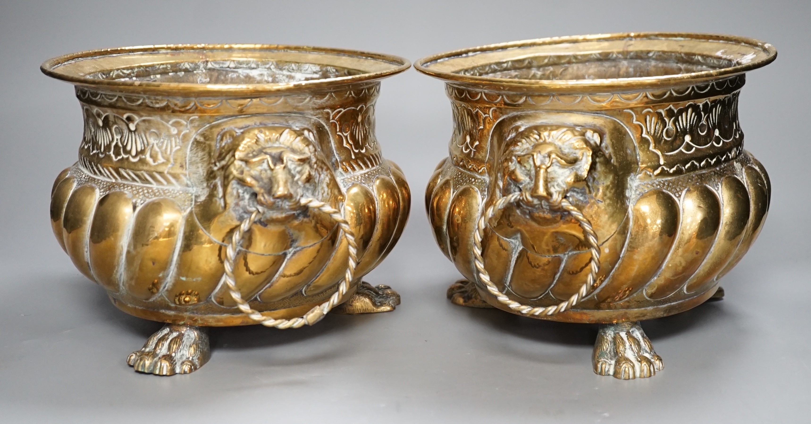 A pair of 19th century Dutch brass two handled jardinieres, 25cm handle to handle